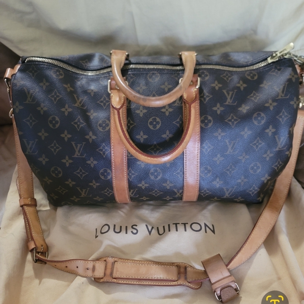 Louis Vuitton  Brown Travel Bag with Signature Style